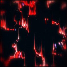 an abstract image of red and black lights