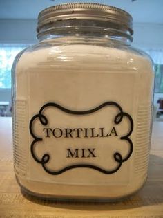 there is a jar with a label on it that says tortilla mix inside