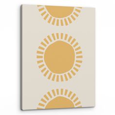 an orange and white wallpaper with two sun designs on the front, one in yellow