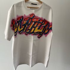 Louis Vuitton Men's Virgil Abloh 1990's Style Graffiti T-Shirt Size L Used Condition Non Smoking Home/Owner **All Offers Should Be Made Using The Offer Option. There Will Be No Response For Those Who Leave Offers In The Comments.** Louis Vuitton Shirts, Louis Vuitton Men, 1990s Fashion, Colorful Shirts, Tee Shirts, Mens Shirts, Louis Vuitton, Mens Tshirts, T Shirt