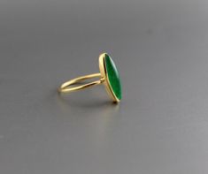 ♦♦ Beautiful handcrafted ring ◘Stone Information: Genuine Green Jade - Color: Green Cut: Marquise Size: 10X16 mm ◘ Metal: 925 Sterling Silver ◘ Band: 2 mm ◘ Setting: Open back bezel setting ◘ Finish: High polish (shiny) ◘ Nickel free ◘ Handmade band: 14 gauge solid sterling wire This ring is adorably rustic, easy to wear, & stackable! ◘Please Note - The Ring in the Picture can be available or Sold out. Every Ring is Made of a Unique Gemstone. Therefore, Colors and Inclusions of the Stone may Green Jade Ring, Jade Color, Green Ring, Pretty Ring, Green Rings, Gold Rings Jewelry, Jade Ring, Ring Stone, Handcrafted Rings