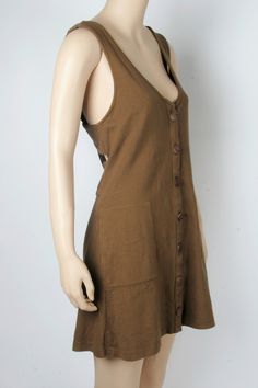 New With Tags Size: Small Color: Army (Brown) Front Button Closure Hip Pockets Dropped Armholes Low Strappy Back Detail Length: 32.5 in Bust: 34 in. Waist: 33.5 in Original Retail $78 100% Cotton Brown V-neck Mini Dress With Buttons, Brown Buttoned Summer Dresses, Brown Summer Dresses With Buttons, Brown Button Closure Beach Dress, Brown Beach Dress With Button Closure, Brown Button Closure Dress For Beach, Brown Cotton Button-up Dress, Brown Beach Dresses With Buttons, Brown Summer Sundress For Vacation