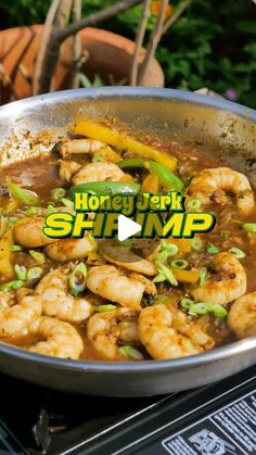 shrimp and peppers cooking in a skillet on top of an electric stove with the words honu park shipmp above it