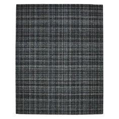 a gray and black plaid rug on a white background