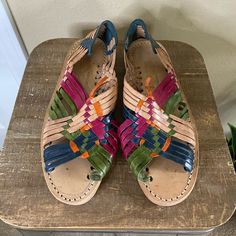 Beautiful And Handmade From Mexico! Colorful Leather Straps. Slip On Style With Back Ankle Security. These Are Like New Condition If Not Brand New. Would Be Amazing This Summer With Dresses Or Shorts! Mexico Size 5, Which Is A Us 8. Casual Woven Leather Huarache Sandals, Fair Trade Leather Sandals For Beach, Multicolor Summer Sandals With Woven Sole, Fair Trade Leather Sandals For Vacation, Fair Trade Open Toe Leather Sandals, Fair Trade Leather Open Toe Sandals, Spring Vacation Woven Leather Huaraches, Colorful Slip-on Sandals For Vacation, Green Leather Bohemian Sandals