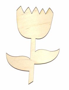 a wooden cutout of a flower on a white background