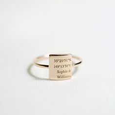 This dainty ring can be personalized with your name, coordinate, roman numeral or any inspired words. Just simply nice to wear anytime, anywhere! CUSTOM STATEMENT RING DETAIL * Dimension: 10x9mm * Material: 925 Sterling Siver * Color: 100% Silver, 18k Gold Plated, 18k Rosegole Plated * Max Characters: up to 4 lines, each line is 10 characters. You can leave it blank. * Words will be engraved on right side as listing product. If you would like to engrave in center, please leave us a note. PRODUCT Modern Personalized Everyday Stackable Rings, Modern Personalized Stackable Rings For Everyday, Modern Personalized Stackable Promise Rings, Modern Personalized Stackable Rings For Promise, Personalized Modern Stackable Rings For Promise, Minimalist Customizable Adjustable Initial Ring, Minimalist Rose Gold Midi Rings As Gift, Minimalist Engraved Adjustable Ring For Everyday, Minimalist 14k Gold Stackable Rings Gift