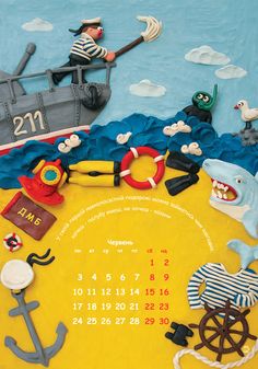 a wall calendar with an image of a pirate ship and other items on the cover