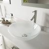 a white sink sitting under a bathroom mirror next to a faucet and soap dispenser