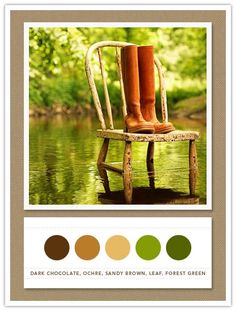 a person's legs in brown boots sitting on a chair with water and trees behind them