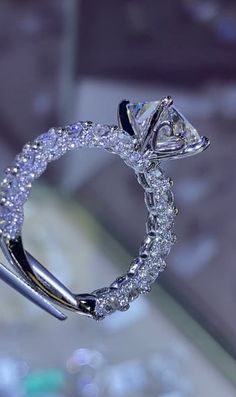 a diamond ring is shown on display at a jeweler's shop in new york