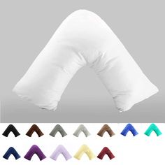 the pillows are all different colors and sizes