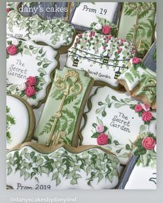 some decorated cookies with flowers and keys on them