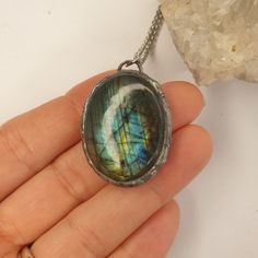 This stunning pendant features a flashy silver soldered labradorite stone.  Stainless steel chain is included. Please indicate if you would like me to adjust the chain length.  Shipping includes tracking  https://www.instagram.com/acushladesigns/ Facebook Page:  https://www.facebook.com/Acushladesigns/ Custom orders welcome ❤️❤️ Silver Oval Electroformed Necklace, Page Facebook, Labradorite Stone, Silver Pendant Necklace, Steel Chain, Stainless Steel Chain, Chain Lengths, Chain Length, Crystal Necklace