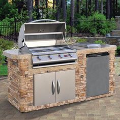 an outdoor bbq with two grills on it