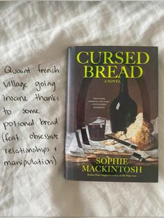 a copy of the book cursed bread by sophie mackton and written in cursive writing