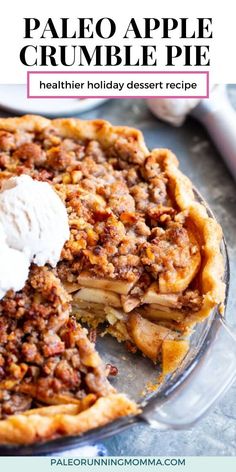 a close up of a pie on a plate with the words paleo apple crumble pie