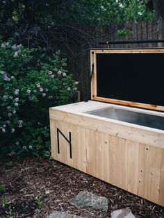 an outdoor hot tub with the door open