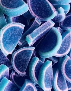 blue and purple candies are piled together