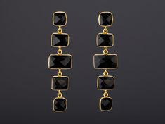 This pair of chained black onyx string earrings with its shining darkness would be a great reward for yourself or a nice gift for your mother or best friend. Each one has a string of five black onyx stones set in gold plated bezels: 1. Stones : five square/rectangular black onyx stones connected in a dangled chain each stone is about 11 x 10mm 2. earring total length ~ 64 mm 3. bezel material: 24k gold plated over sterling silver 4. earring post: 24k gold plated over sterling silver 5. if sendin Elegant Rectangular Linear Earrings As Gift, Elegant Rectangular Linear Earrings For Gift, Elegant Rectangular Jewelry For Evening, Black Gemstone Jewelry For Party, Formal Black Jewelry With Rectangular Shape, Black Rectangular Jewelry For Formal Occasions, Luxury Black Onyx Earrings, Minimalist Dangle Jewelry For Evening, Elegant Handmade Linear Earrings For Parties