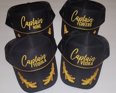 Hey there Captain! Are you ready for some laughter with these Captain "cocktail" hats?  Golden vinyl on a black Captain hat. Captain hat has golden cord and stitching. Classic and fun at the same time. You'll surely be the talk of the town when you wear this out. Buy one for each person of your crew. Otto Brand hat. Buy yours now and join the fun! *Name of drink can changed. Please reach out with a message if interested. Black Snapback Mini Hats For Party, Black Trucker Hat For Party With Curved Brim, Black Trucker Hat With Curved Brim For Party, Black Curved Brim Trucker Hat For Party, Gold Costume Hat As A Gift, Gold Cap Hat As Gift, Adjustable Gold Mini Cap, Cheer Captain, Yacht Party