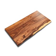 a wooden cutting board on a white background