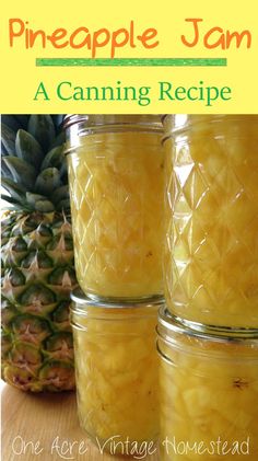 three jars filled with pineapple jam sitting on top of a table