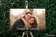 an easel with a wedding photo on it