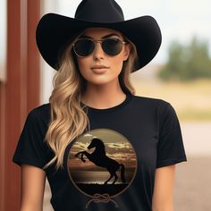 Experience the beauty of the wild west with this Rearing Horse at the Beach tee. Featuring a majestic rearing horse against a stunning backdrop of sun, sand, and surf at sunset, this unique design brings a bold western vibe to any look. Be the envy of the town! Horse At The Beach, Coastal Western, Rearing Horse, Western Lifestyle, Beach Tee, Beach T Shirt, You Deserve Better, The Wild West, Long Cut