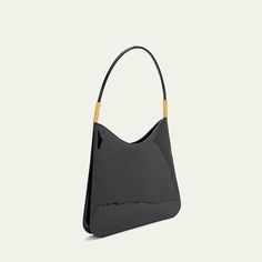 Saint Laurent "Sadie" hobo bag in patent leather  Flat shoulder strap Open top Interior, one zip pocket  Bronze hardware  Lining: Cotton Approx. 11.4"H x 12.2"W x 0.8"D Made in Italy Luxury Shoulder Bag With Glossy Finish And Double Handle, Modern Glossy Finish Shoulder Bag For Shopping, Elegant Double Handle Shoulder Bag With Glossy Finish, Modern Glossy Finish Shoulder Bag For Everyday, Modern Glossy Finish Shoulder Bag, Everyday Patent Leather Bag With Detachable Handle, Chic Patent Leather Shoulder Bag For Everyday Use, Modern Patent Leather Top Handle Bag, Patent Leather Bag With Detachable Handle For Everyday Use