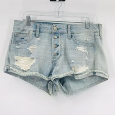 Abercrombie & Fitch Low Rise Boyfriend Shorts Distressed Size 29 Exposed Button Fly, Distressed, Cuffed And Frayed Hems. New With Tags. Waist 17.5 Rise 10.5 Inseam 2 Light Wash Summer Bottoms With Buttons, Light Wash Buttoned Shorts For Spring, Spring Light Wash Shorts With Buttons, High Rise Buttoned Light Wash Shorts, Blue Cutoff Bottoms With Buttons, Light Wash Cutoff Shorts With Buttons, Blue Buttoned Cutoff Bottoms, Blue Relaxed Fit Distressed Shorts, Mid-rise Light Wash Shorts With Buttons