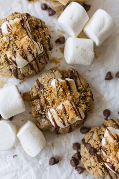 three cookies with marshmallows and chocolate chips