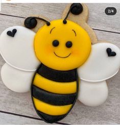 a cake shaped like a bee with wings