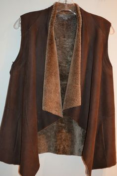 Vince Brown Leather Sherpa Lining Sleeveless Vest Coat Size Small.  Vest measures 20" armpit to armpit lining flat, 26" overall length. Clothes come from a nonsmoking pet free home.  Thanks for looking. Vest Coat, Sleeveless Vest, Brown Leather, Overalls, Pet, Best Deals, Leather, Clothes