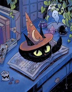 a black cat wearing a witches hat sitting on top of a table next to a book