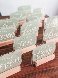 place cards with names on them sitting on a table