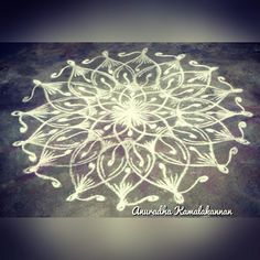 a white flower is drawn on the ground