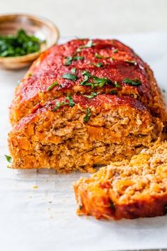 the meatloaf is cut into slices and ready to be eaten