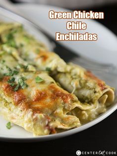 green chicken enchiladas on a white plate