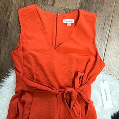 This Stunning Calvin Klein Romper Is Brand New With Tags Attached! Beautiful Burnt Orange In Color And A Size 8 W 24” Inseam (Cropped). Spring Chic Calvin Klein Jumpsuits And Rompers, Calvin Klein Summer Workwear Jumpsuits And Rompers, Calvin Klein Summer Jumpsuits And Rompers For Work, Chic Calvin Klein Jumpsuits And Rompers For Summer, Chic Calvin Klein Summer Jumpsuits And Rompers, Calvin Klein Fitted Jumpsuits And Rompers For Work, Calvin Klein Fitted Workwear Jumpsuits And Rompers, Calvin Klein Fitted Jumpsuits For Work, Chic Calvin Klein Workwear Jumpsuits