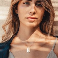 DETAILS
- Made with 14k recycled premium solid gold
- Set with round single cut diamonds of H/SI1 Quality
- Dogtag Measurement: 26 x15 mm
- Thickness: 1.40 mm
- Total Diamond Weight: 0.035 Carat


Handcrafted from the finest 14K gold, this dog tag necklace has an edgy and contemporary touch. Adding brilliance to this piece is a a single round ethically sourced diamond perfect for your daily ensemble. Everyday White Gold Jewelry With Single Cut Diamonds, Everyday White Gold Oval Pendant Jewelry, Minimalist Diamond White Jewelry With Polished Finish, Minimalist Polished Diamond White Jewelry, Minimalist Diamond Rectangular Pendant Jewelry, Engraved White Gold Rectangular Pendant Jewelry, Sterling Silver Dog Tag Jewelry For Anniversary, White Gold Dog Tag Jewelry Gift, Minimalist White Gold Dog Tag Jewelry