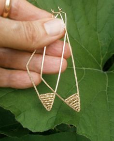 what happens when your dog destroys your favorite earrings? these are what happens. @Michelle Bellanti Gold Triangle Beaded Bohemian Earrings, Gold Wire Wrapped Hoop Earrings For Summer, Summer Gold Wire Wrapped Hoop Earrings, Minimalist Gold Beaded Earrings With Ear Wire, Gold Minimalist Hoop Beaded Earrings, Gold Minimalist Beaded Hoop Earrings, Gold Beaded Geometric Jewelry, Geometric Beaded Gold Jewelry, Gold Geometric Beaded Jewelry