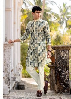 *PRODUCT DETAILS:- A juxtaposition of complex ethnic designs on a classic anchor cream base, paired with a off white churidar payjama lends an ornate charm to this kurta set. The non sheeny blended pure linen body features mix printed design all over the the kurta. A raised bandhgala collar and buttoned half placket closure outline the neck, adorned with elaborate needlework add definition to the dynamic outfit, which is ideal for evening occasions. Complete the outfit with a brown toned watch and a pair of brown jutis. *FEATURES:- Color:  Duck green +cream+ light grey Fabric: 100% pure linen silk Design Type: Embroidery for kurta only Items Included:  (i)  Kurta ,                                (ii) Payjama (100% heavy tensile dyed) Wash Care: Dry Clean Only Disclaimer Text: Product color Unstitched Cream Kurta With Printed Motifs, Festive Cream Kurta With Printed Motifs, Cream Long Sleeve Kurta With Printed Motifs, Traditional Off-white Kurta With Printed Motifs, Traditional Kurta With Printed Border For Eid, Festive Beige Kurta With Printed Motifs, Traditional Beige Printed Sets, Cream Printed Sets For Eid, Cream Printed Set For Eid