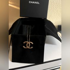 Chanel “Cj” Pendant Necklace. Costume Jewelry Chanel Pendant Gold Necklace, Chanel Box And Pouch Included: $495 Chanel Pendant, Necklace Chanel, Jewelry Chanel, Chanel Box, Chanel Accessories, Pendant Gold, Gold Pendant Necklace, Gold Pendant, Costume Jewelry