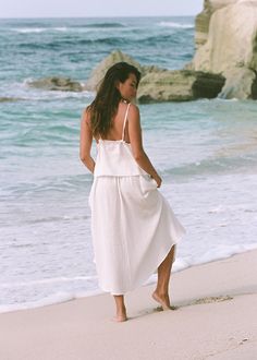 Breezy Flowy Skirt For Vacation, Breezy Beach Maxi Skirt, Breezy Relaxed Maxi Skirt For Beach, Breezy Beach Maxi Skirt With Relaxed Fit, Breezy Beach-style Lined Skirt, Breezy Beach Skirt With Lining, Breezy Lined Beach Skirt, Breezy White Skirt For The Beach, White Breezy Skirt For The Beach