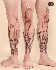 the legs and ankles of a person with tattoos on them are covered in grass flowers