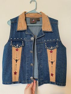 Vintage western vest, Don't mess with Texas, size M, with stud and western designs.  Condition: This vest is in great condition! I don't see any stains or damage. Bottom button was resewed. Vintage items are often pre-owned. I do my best to report condition accurately, if you feel as though I have misrepresented an item please contact me immediately. I will do what I can to work with you and figure out how to remedy any grievances.  House Savvy is not responsible for lost or stolen packages, but Western Style Vest With Pockets For Fall, Western Style Denim Vest For Fall, Western Style Sleeveless Vest For Rodeo, Western Rodeo Vest, Western Designs, Western Vest, Tyler Tx, Western Design, Vest Outfits