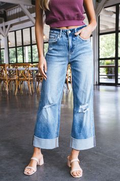 These Mira jeans defy gravity with super hi rise and cuffed, baggy, wide legs. Light distressing adds a touch of cool. Rise to the occasion (or just lounge in style) with Rosy. General Info: 98.5% Cotton, 1.5% Spandex Machine Wash Cold; Tumble Dry Low Super Hi Rise - 11" Cuffed Baggy, Wide Legs Light Distressing Denim Model Info: Height: 5’8” | Bust: 30.5” | Waist: 23.5” | Hip: 33” | Size Shown: 24 Distressing Denim, Black White Parties, Sporty Girls, Vintage Havana, White Party, Summer Breeze, Summer Parties, Wide Legs, Baggy Jeans