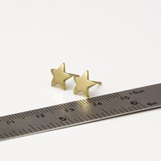 Minimalist gold star stud earrings, handmade of yellow 14k solid gold, with a highly shiny finish. These gold star studs are perfect for every occasion, great for any age. Chic and stylish, a wonderful gift for yourself or for someone you love. Star's hight is ~8.5 mm = ~0.33 inch Star's width is ~8.5 mm = ~0.33 inch 14k solid gold ear backs are included. * The earrings will be packed in a gift box ready to give as a gift, and shipped via Express mail service which usually takes 5-8 business day Minimalist Yellow Gold Star Earrings, Yellow Gold Star Earrings For Everyday, Everyday Star-shaped Yellow Gold Earrings, Everyday Yellow Gold Star Earrings, Gold Star-shaped Minimalist Earrings, Minimalist Gold Star Earrings, Gold Star Earrings, Star Stud Earrings, Stud Earrings Gold