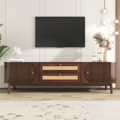 Description: Our beautiful and elegant rattan TV cabinet adds timeless elegance to your living space. Designed with attention to detail, this beautiful piece of furniture will add a warm and natural feel to your home. The combination of brown and warm wood tones gives your room a harmonious look that can be easily integrated into different interior styles. Specifications: Dimension of Overrall Product: 66.93'' * 15.55'' * 18.11'' Weight of Overrall Product: 65.26lbs Capacity: Overrall:110.23lbs/ Farmhouse Media Console, Curved Tv Stand, Rattan Tv Stand, Tv Console Table, Farmhouse Tv Stand, Console Tv, Solid Wood Cabinets, Solid Wood Doors, Mobile Tv